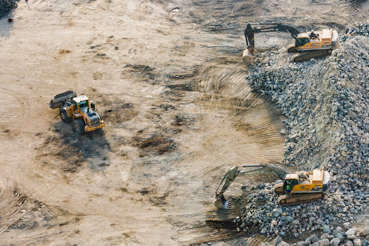 services-05 Aerial shot of heavy machinery working on a construction site in Dubai.