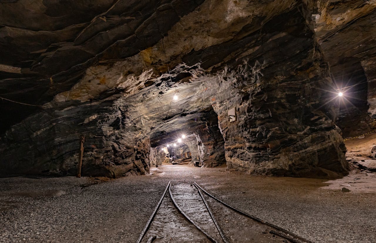 get-in-touch Explore the mysterious depths of Passagem de Mariana, MG, Brazil, with this illuminated underground mine tunnel.